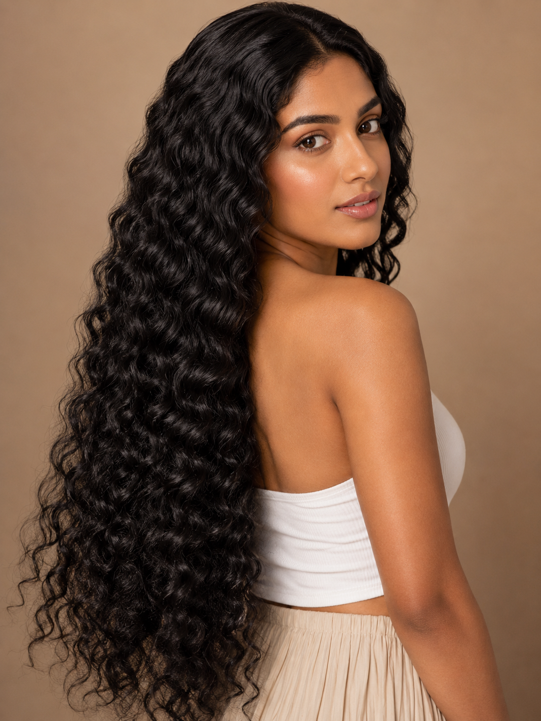 Indian virgin deep curly hair extensions bundles from Gaurash Beauty Supply Inc, showcasing natural deep curly texture and rich color