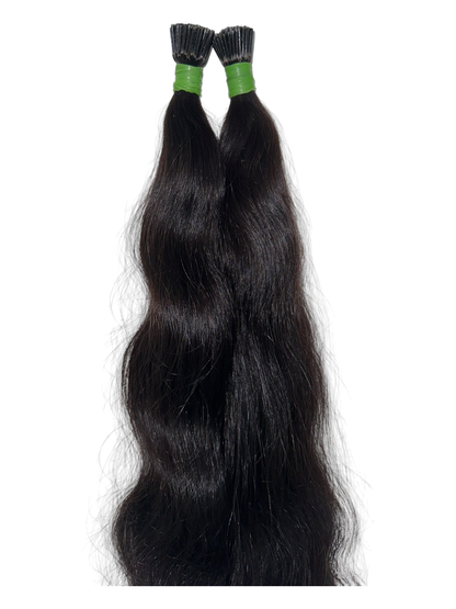 Indian virgin wavy keratin tip hair extensions by Gaurash Beauty Supply Inc showing smooth wavy hair strands with keratin tips