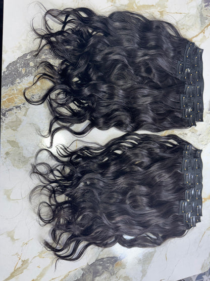 Indian Virgin Wavy Clip-On Hair Extensions by Gaurash Beauty Supply Inc, showing the wavy, natural-looking clip-on hair set.