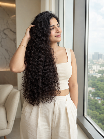 Indian kinky curly virgin human hair bundle from Gaurash Beauty Supply, showcasing thick, tightly coiled natural hair texture.