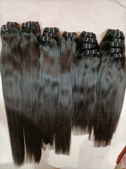 Indian raw straight hair bundles from Gaurash Beauty Supply Inc, showcasing shiny, natural straight hair extensions.