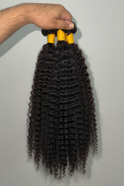 Indian kinky curly virgin human hair bundles in 100g, featuring natural texture and rich curls from Gaurash Beauty Supply.