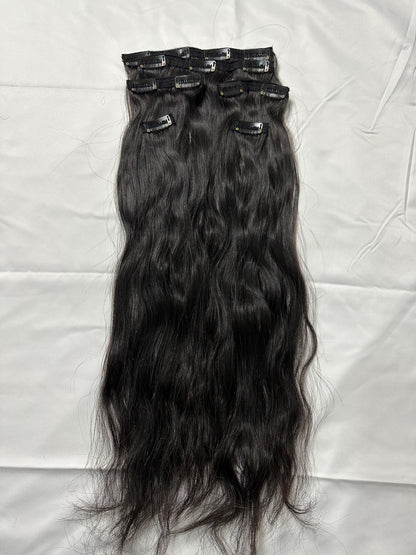 Wavy clip-in human hair extensions by Gaurash Beauty Supply, Virgin Indian hair, 120g, showing wavy hair strands with clips attached