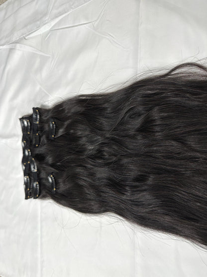 Wavy clip-in human hair extensions by Gaurash Beauty Supply, Virgin Indian hair, 120g, shown with natural waves and clips attached