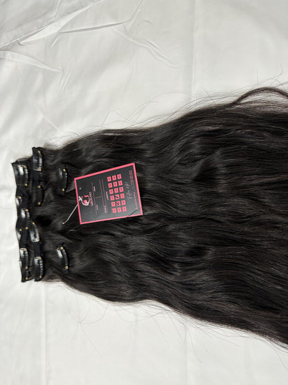 Wavy clip-in human hair extensions by Gaurash Beauty Supply, virgin Indian hair, 120g, shown in natural wavy style