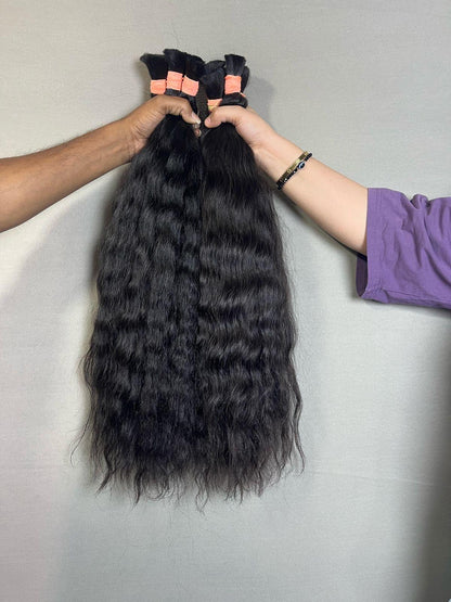 Natural Indian curly bulk hair from Gaurash Beauty Supply, single donor, 300 grams, showcasing soft, textured curls.
