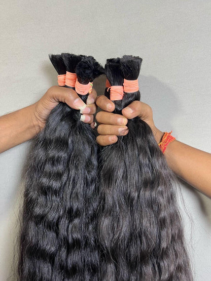 Raw Indian curly bulk hair from Gaurash Beauty Supply, natural texture, single donor, 300 grams, shown in natural light.