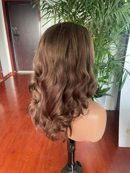Chocolate brown curly lace front wig made of raw human hair, salon quality, styled with natural curls from Gaurash Beauty Supply.