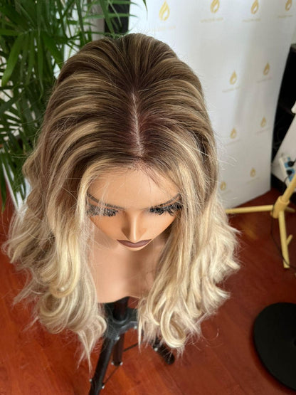Ash blonde lace-front wig on mannequin head, natural hairline and center part