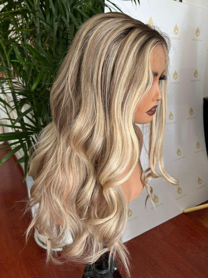 Ash blonde lace-front wig with long loose waves and natural side part